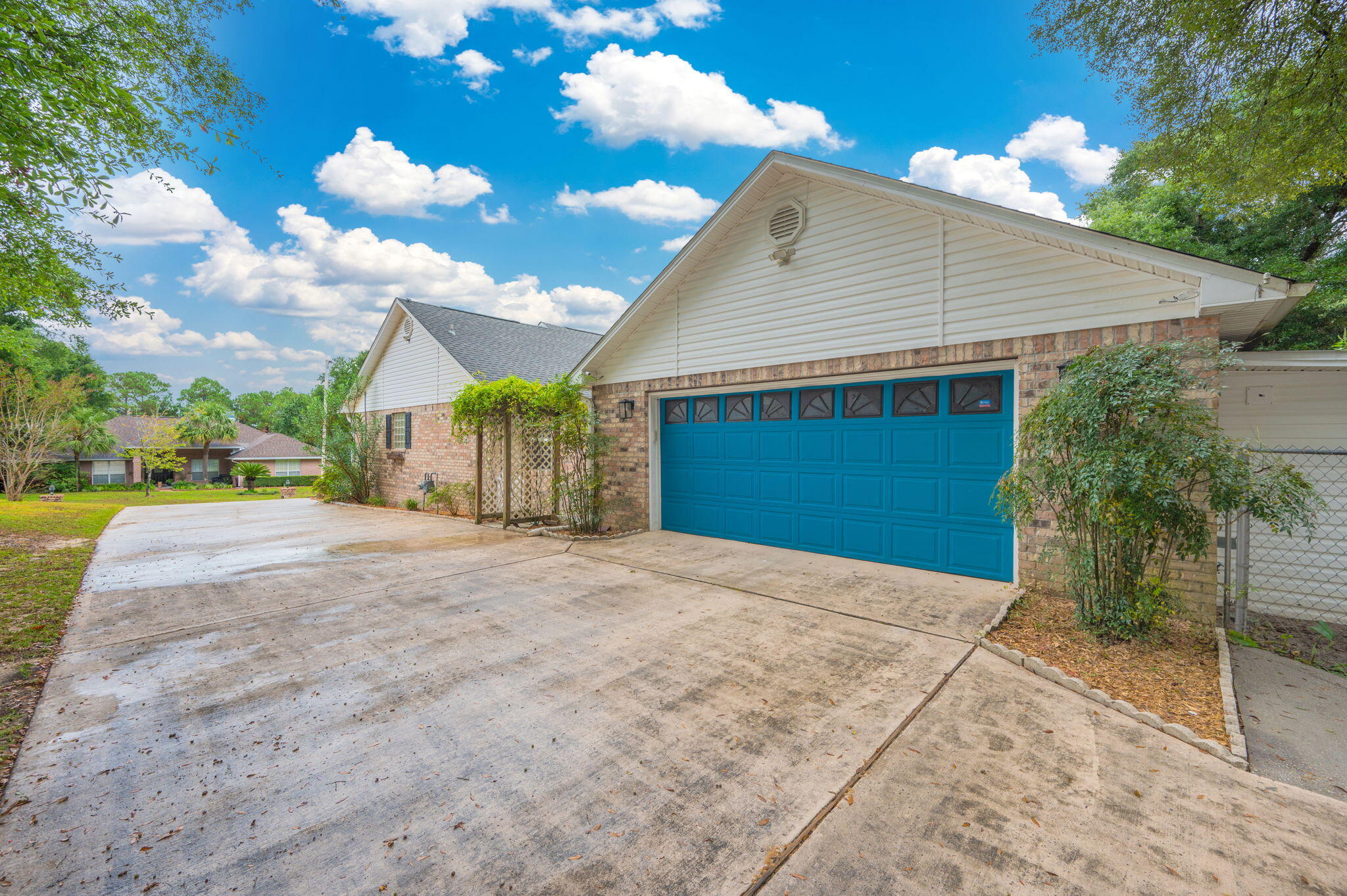109 Eagle Drive Crestview, FL 32536 - Photo 47 of 52 a view of a house with a yard and garage