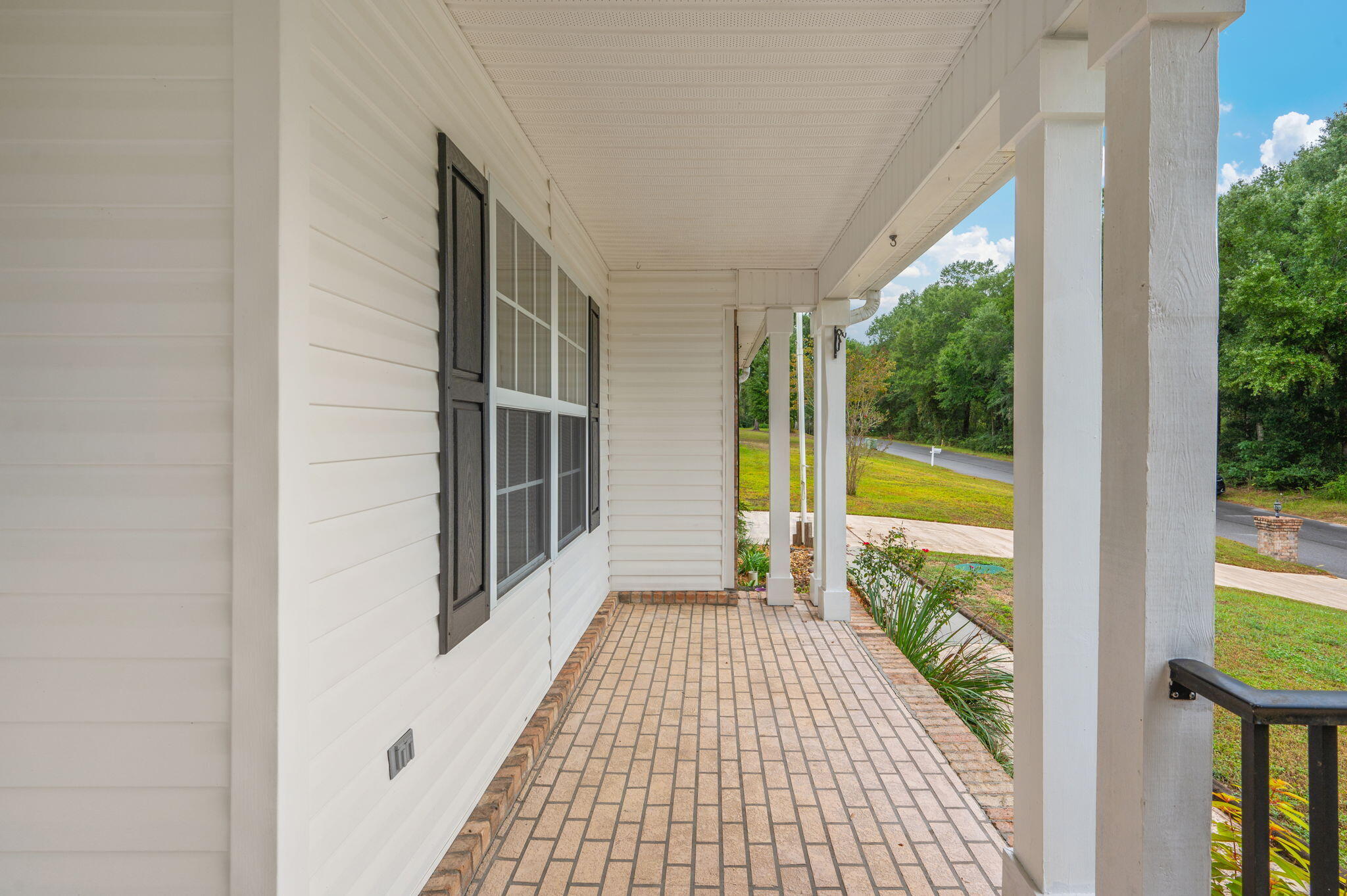 109 Eagle Drive Crestview, FL 32536 - Photo 7 of 52 a view of balcony with a swimming pool