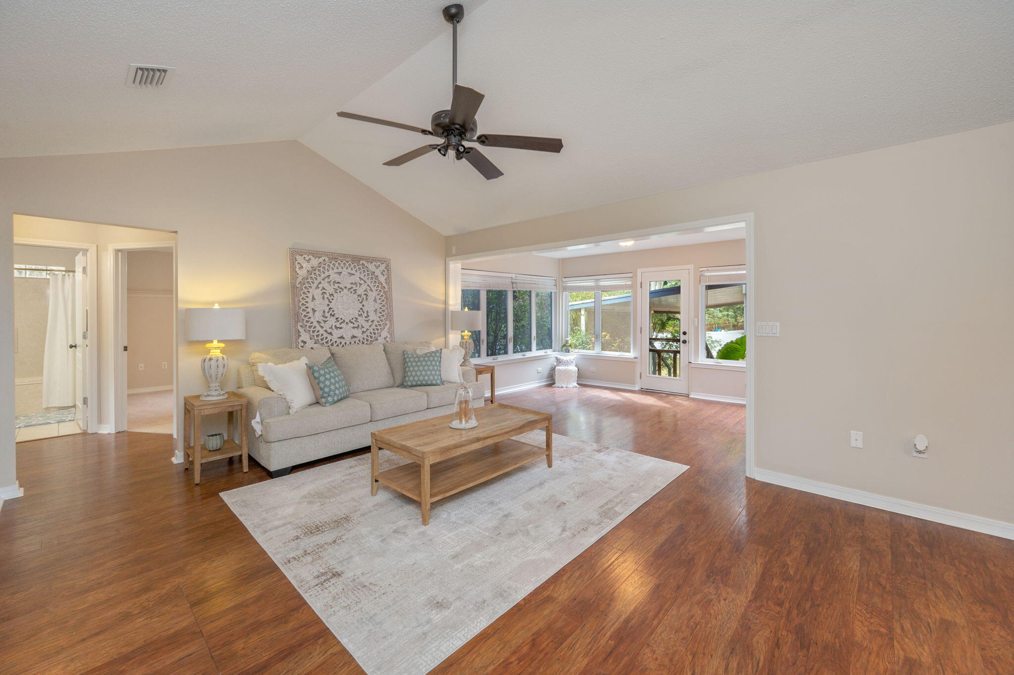 109 Eagle Drive Crestview, FL 32536 - Photo 9 of 52 a living room with furniture and a wooden floor