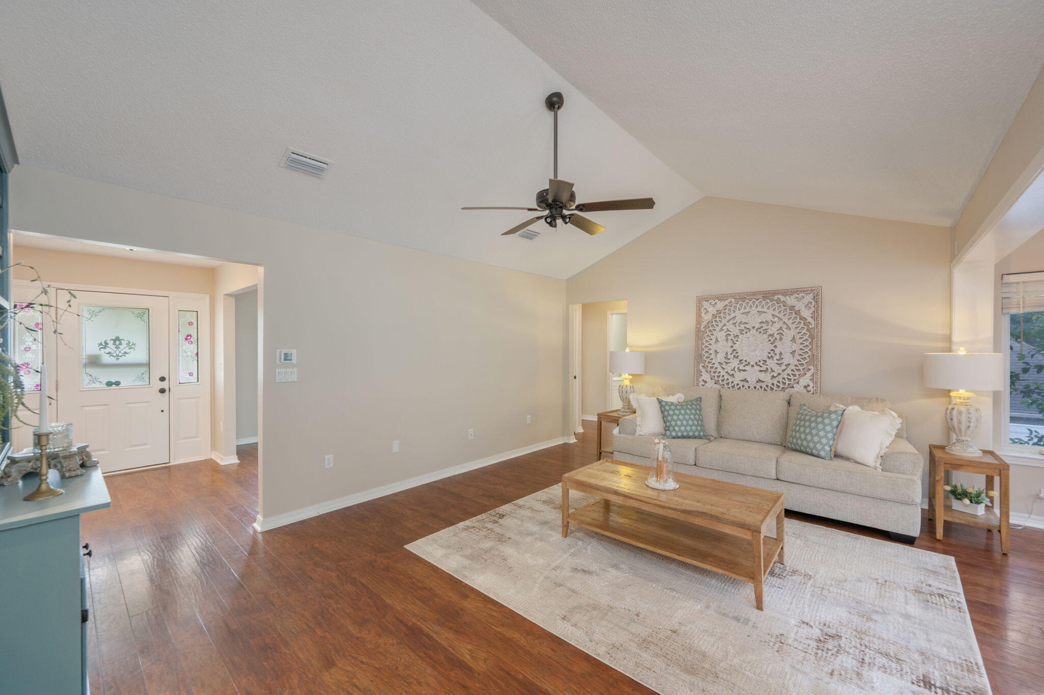 109 Eagle Drive Crestview, FL 32536 - Photo 10 of 52 a living room with furniture and a wooden floor