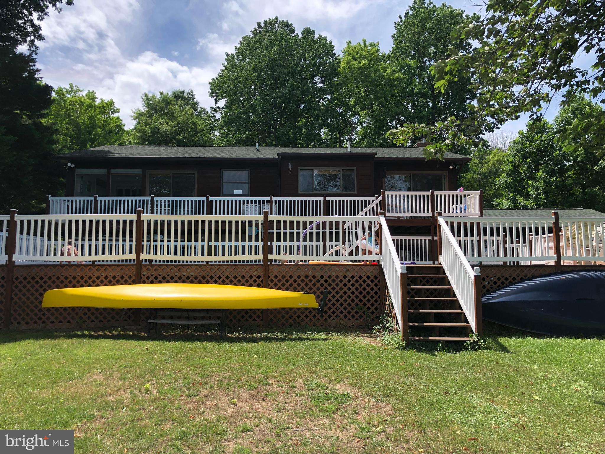 144 Windcliff Road Prince Frederick, MD 20678 - Photo 5 of 47 Back of house & pool decking