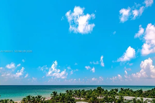 a view of a house with a big yard