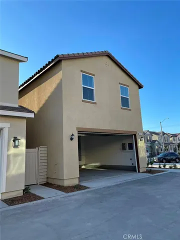 a view of a house with a garage