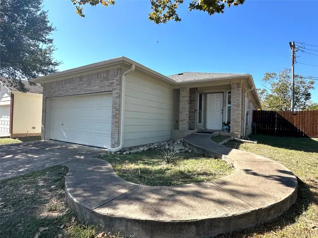 a view of a house with swimming pool
