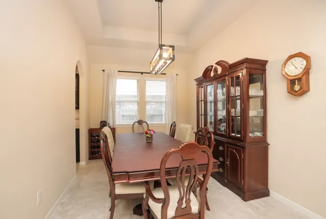 a kitchen with a sink cabinets and window