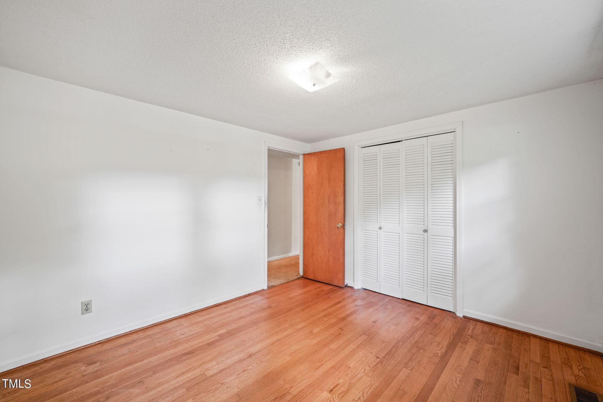 3015 Old Raleigh Road Apex, NC 27502 - Photo 20 of 47 a view of an empty room and wooden floor