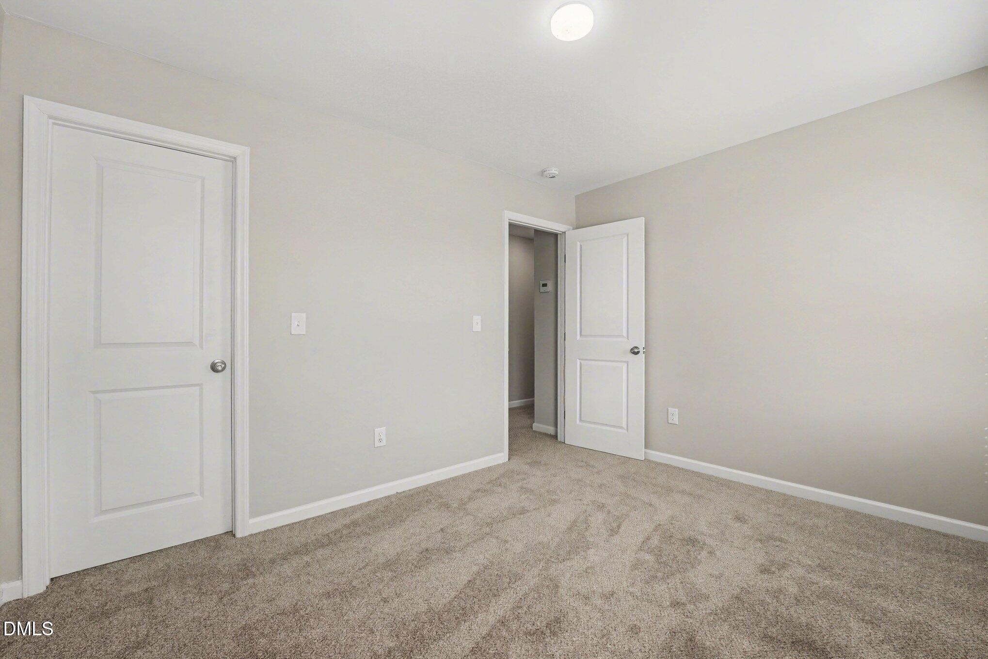 106 Two Daughters Streme Smithfield, NC 27577 - Photo 19 of 25 a view of an empty room