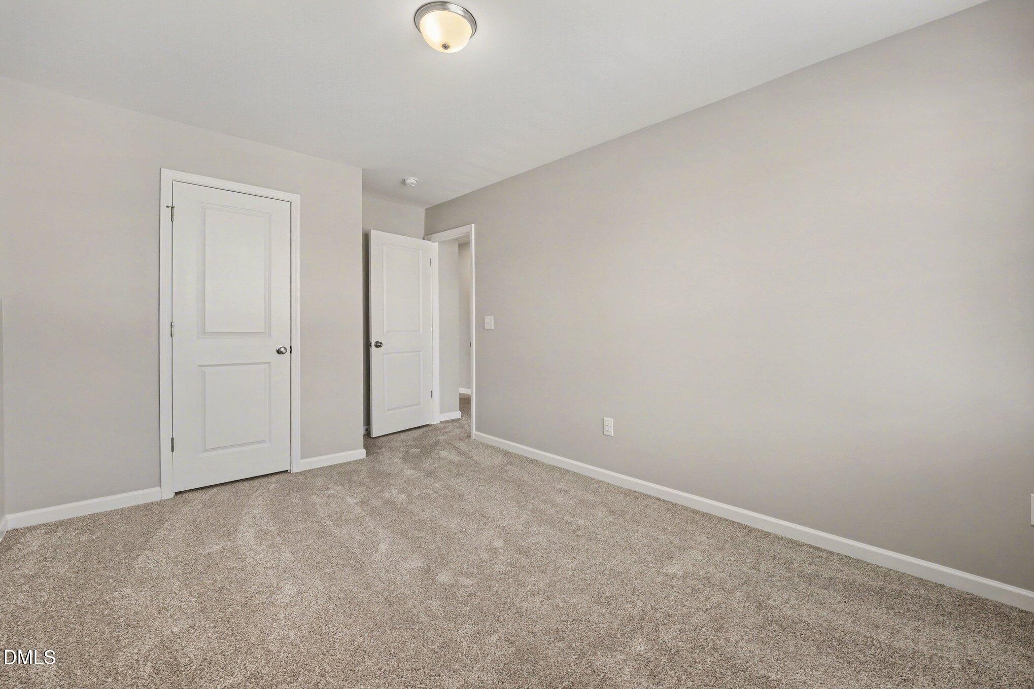 106 Two Daughters Streme Smithfield, NC 27577 - Photo 21 of 25 a view of an empty room