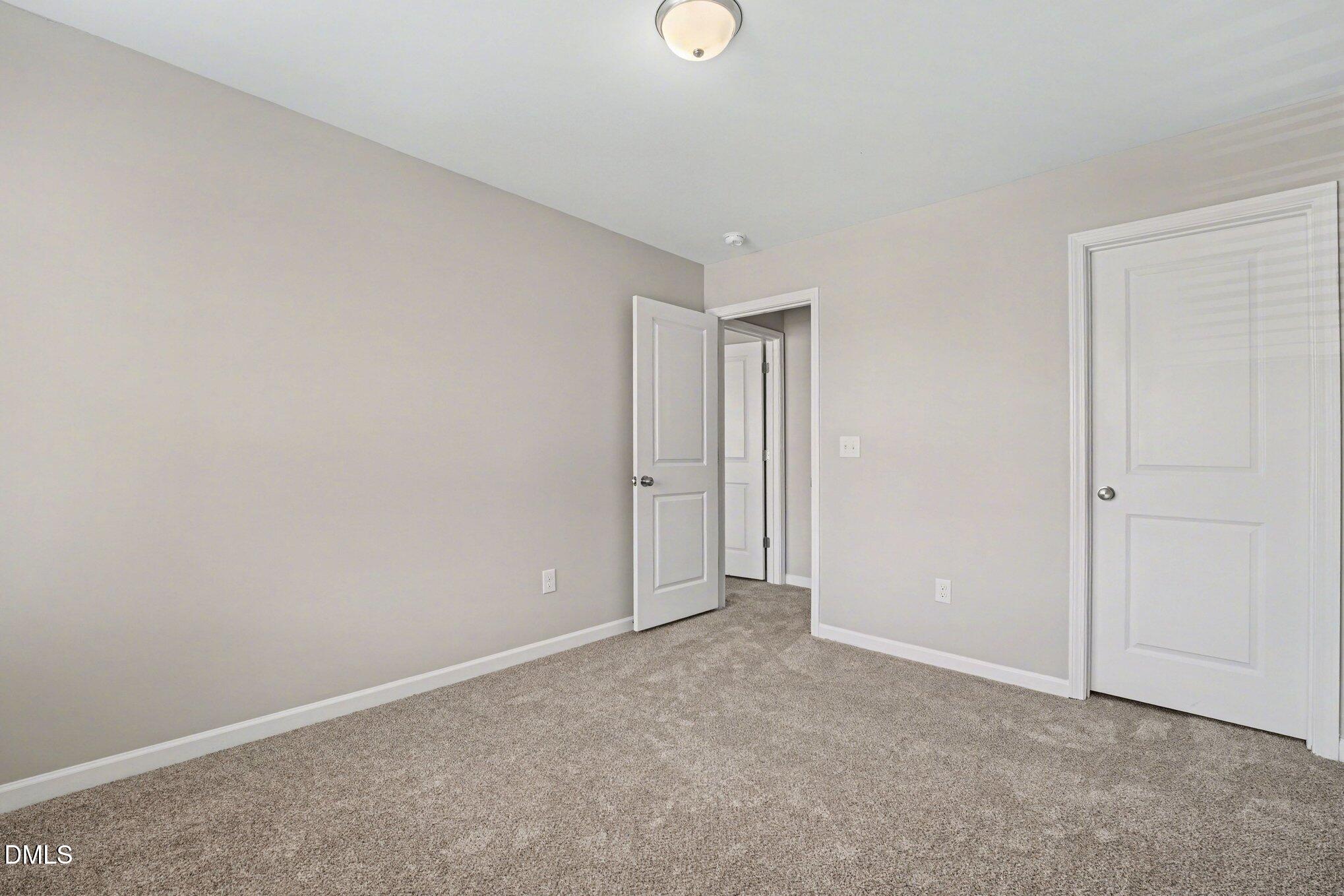 106 Two Daughters Streme Smithfield, NC 27577 - Photo 23 of 25 a view of an empty room