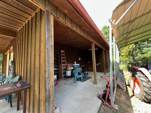 a view of a building with sitting area