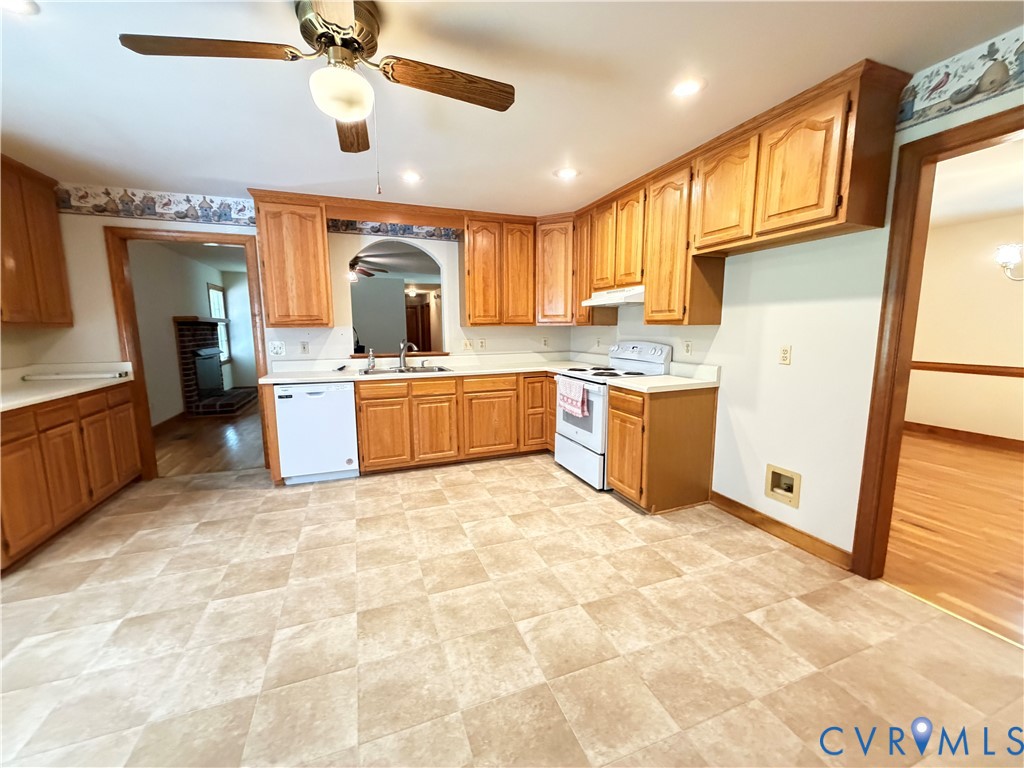 3933 Dunraven Road North Chesterfield, VA 23236 - Photo 19 of 30 a kitchen with stainless steel appliances granite countertop a sink and cabinets