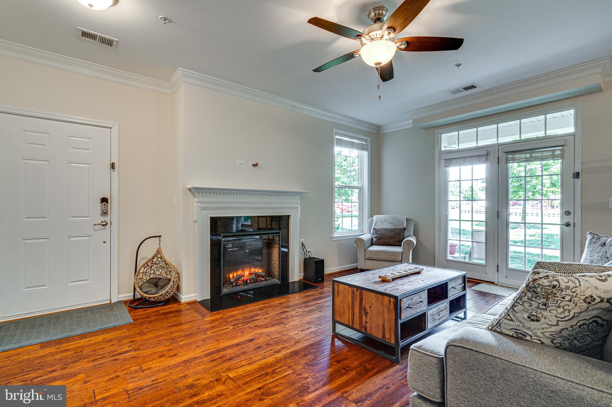 42554 Sunset Ridge Square Ashburn, VA 20148 - Photo 7 of 33 Cozy Electric Fireplace and Walk Out Patio