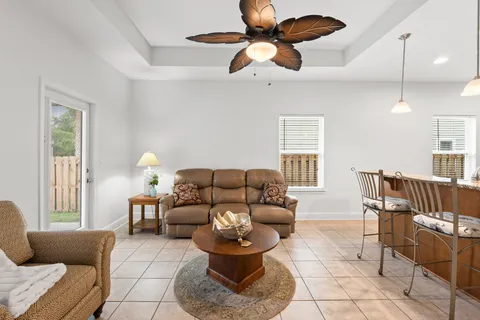 a living room with furniture and a window