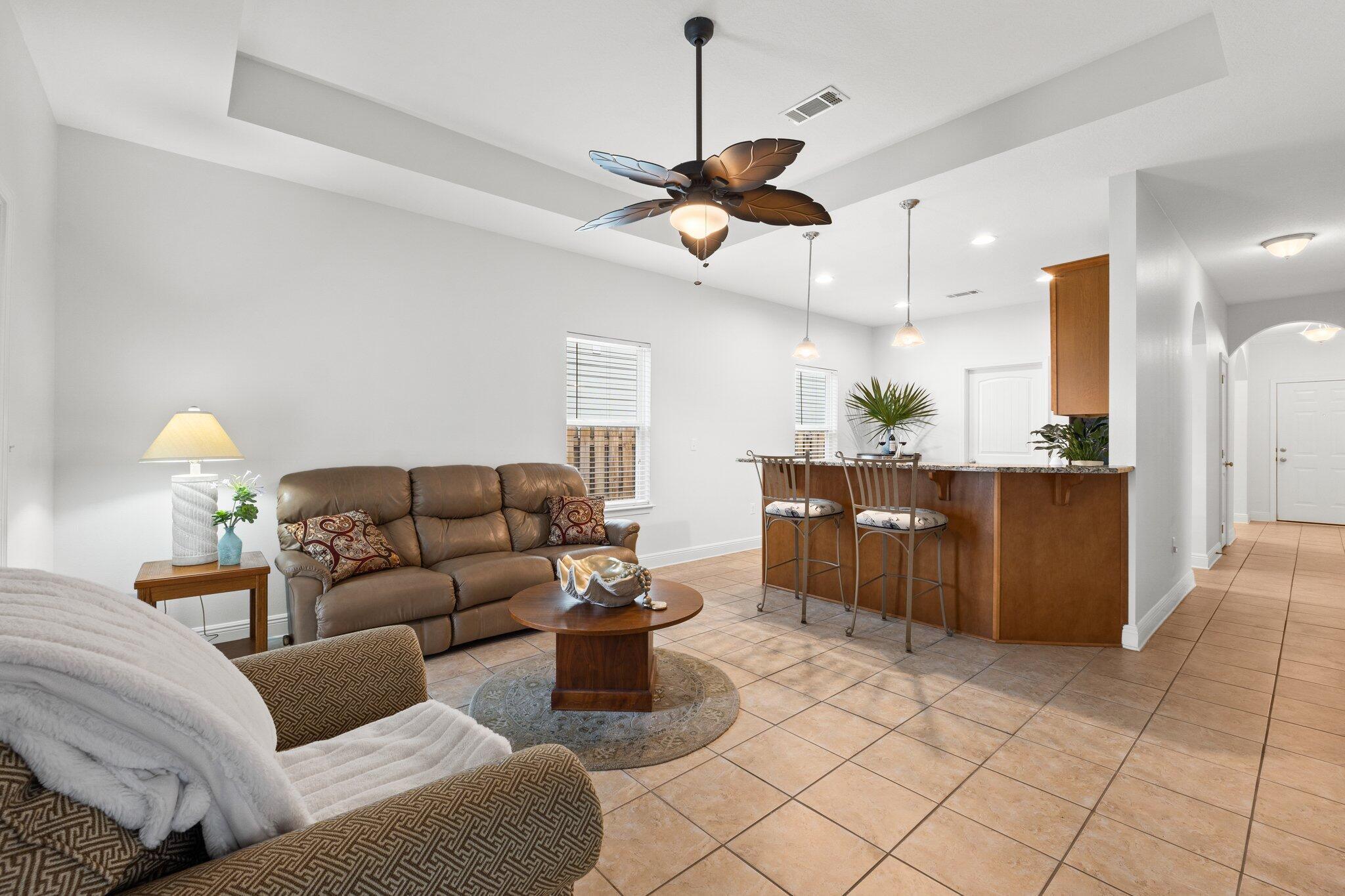 102 Turtle Cove Panama City Beach, FL 32413 - Photo 13 of 42 a living room with furniture