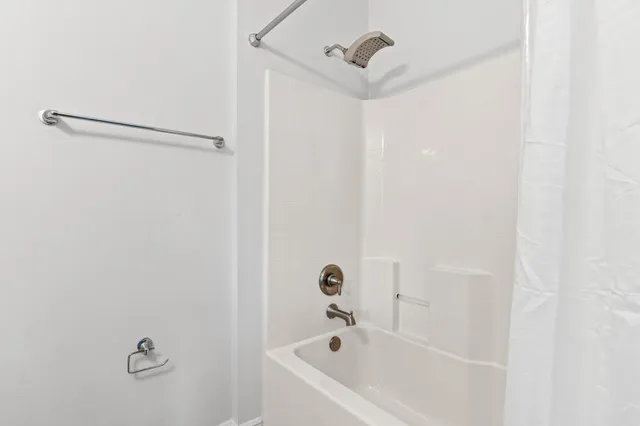 a bathroom with a bathtub