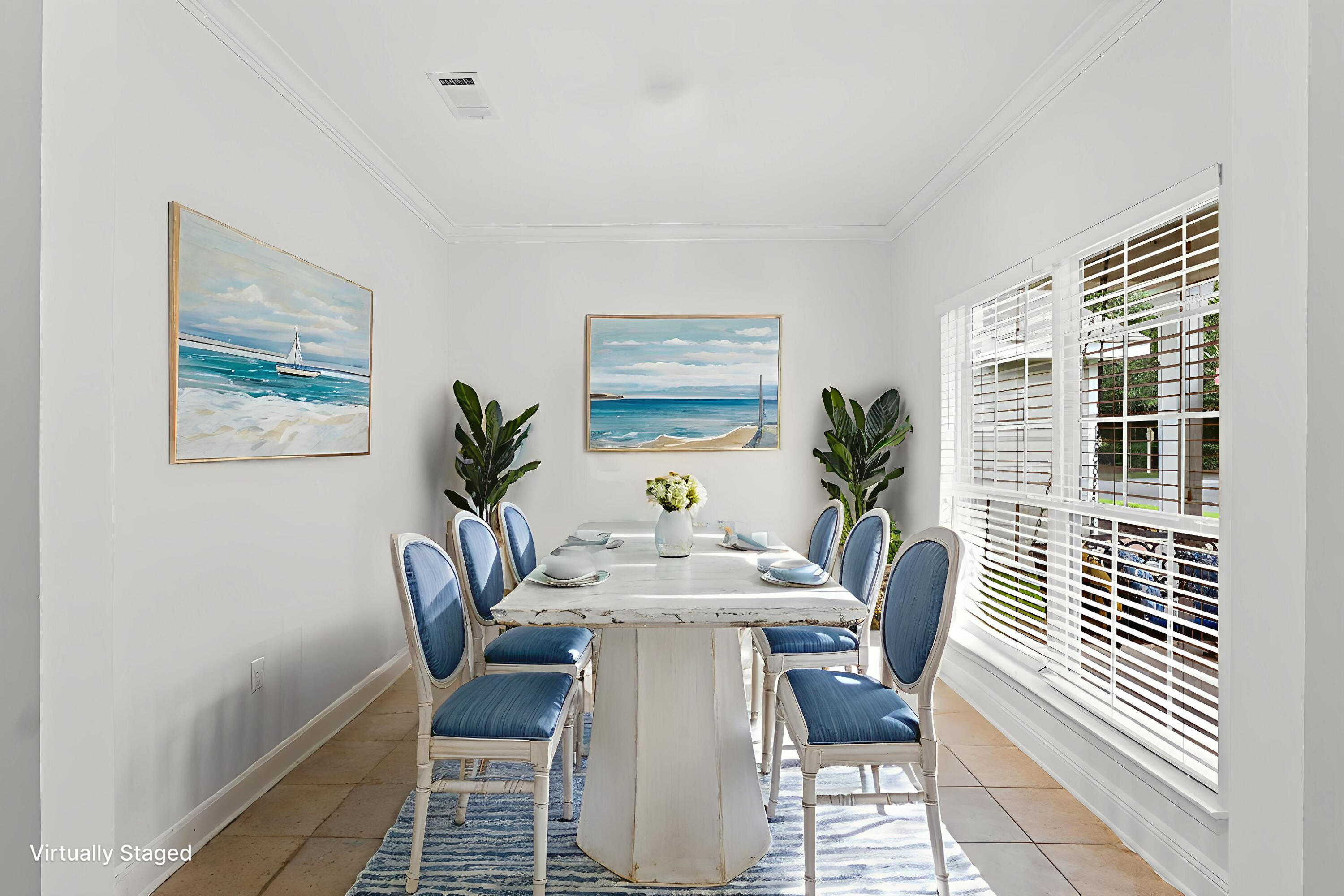 102 Turtle Cove Panama City Beach, FL 32413 - Photo 6 of 42 a dining room with furniture and window