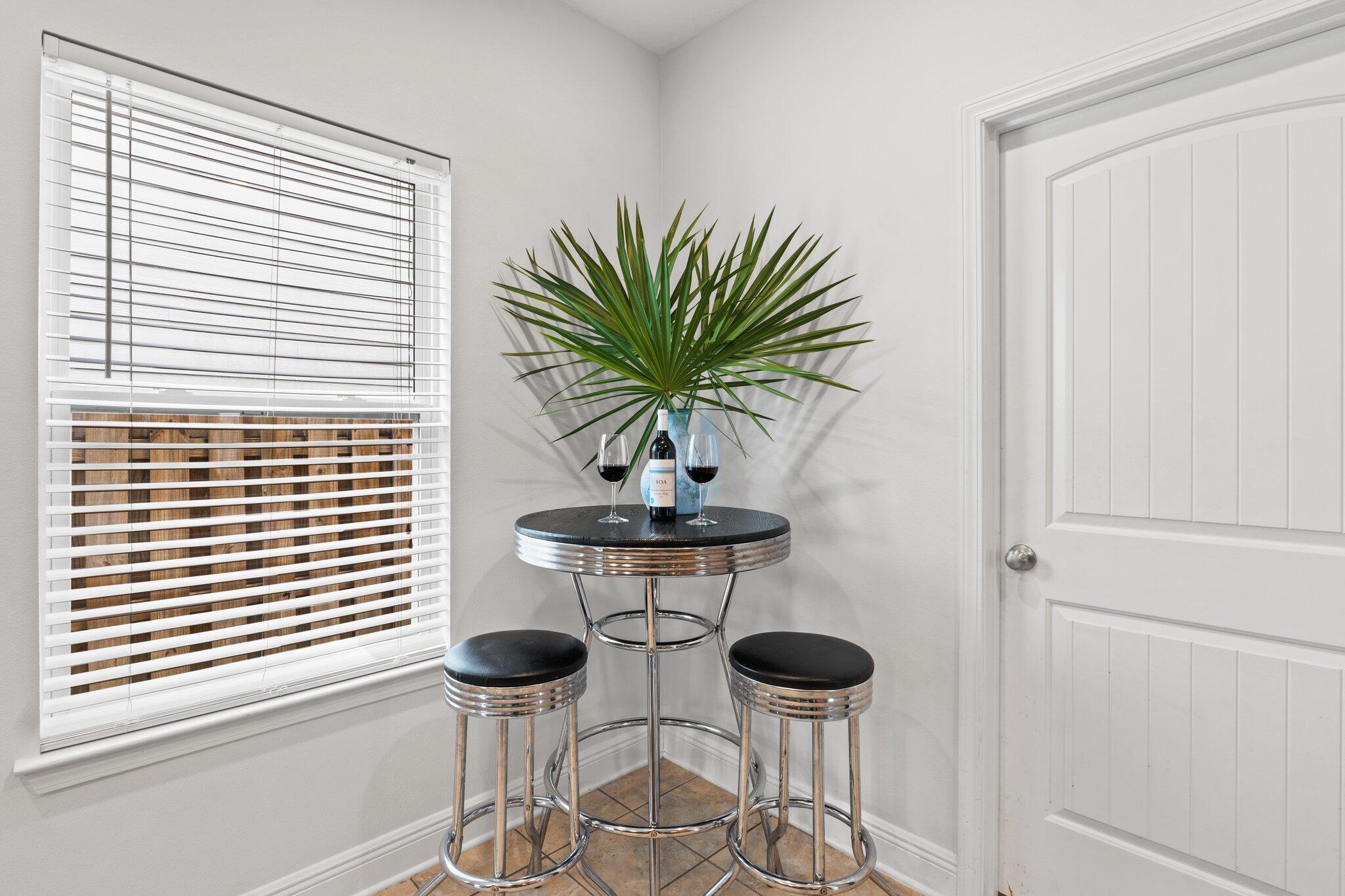 102 Turtle Cove Panama City Beach, FL 32413 - Photo 10 of 42 a view of a room with a potted plant and a window