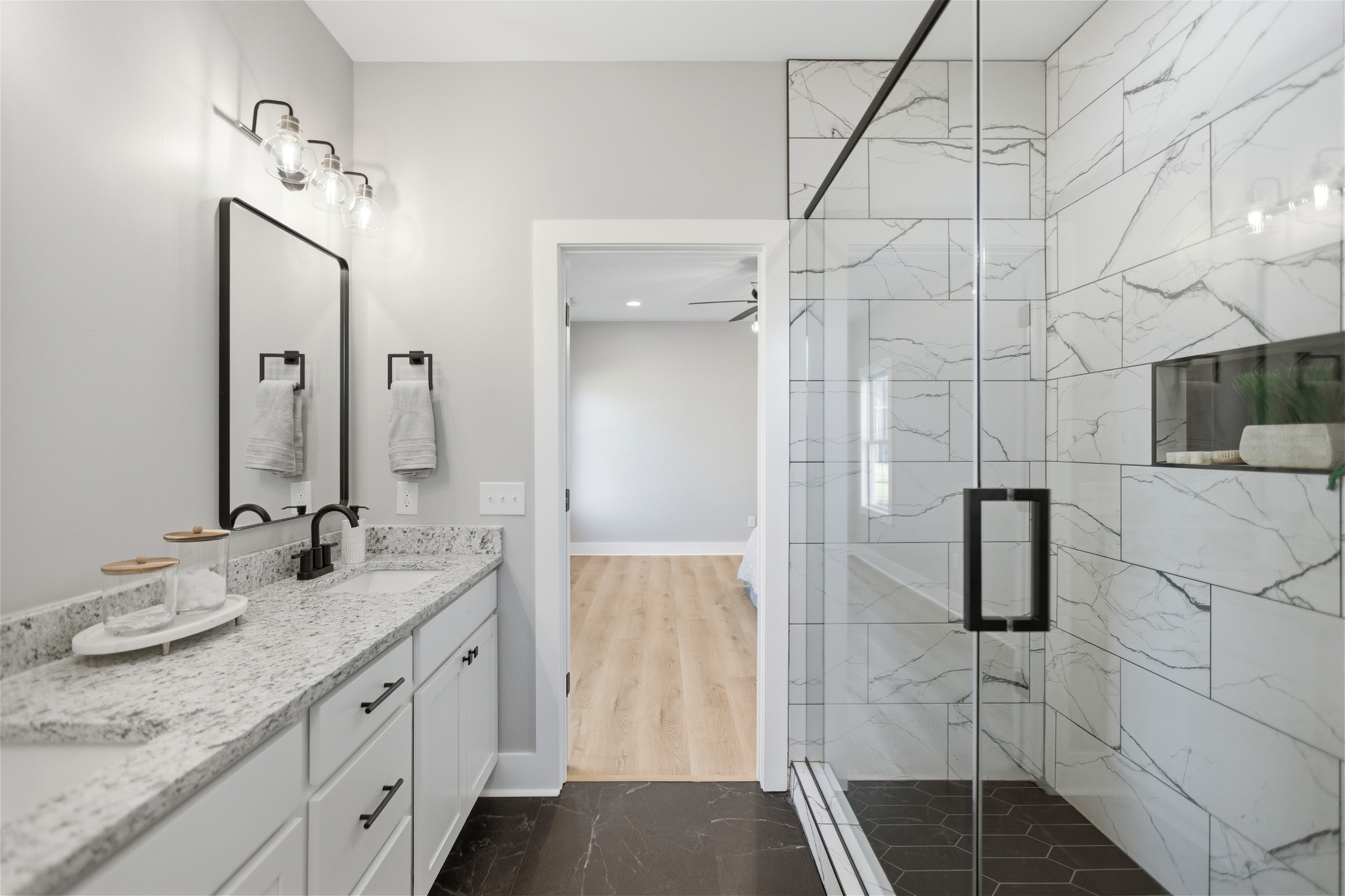 90 Kings Lane Tullahoma, TN 37388 - Photo 29 of 39 a bathroom with double vanity and two mirrors