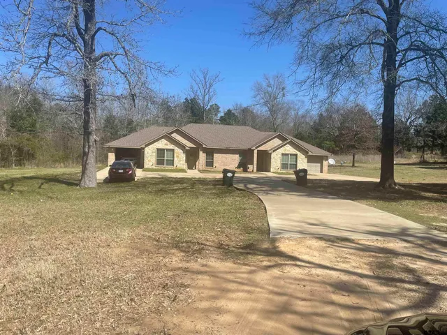 a view of a house with a patio