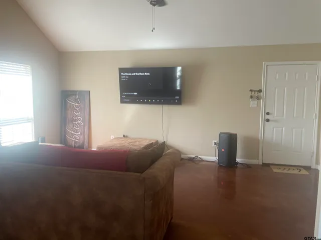 a view of a hallway to a bedroom