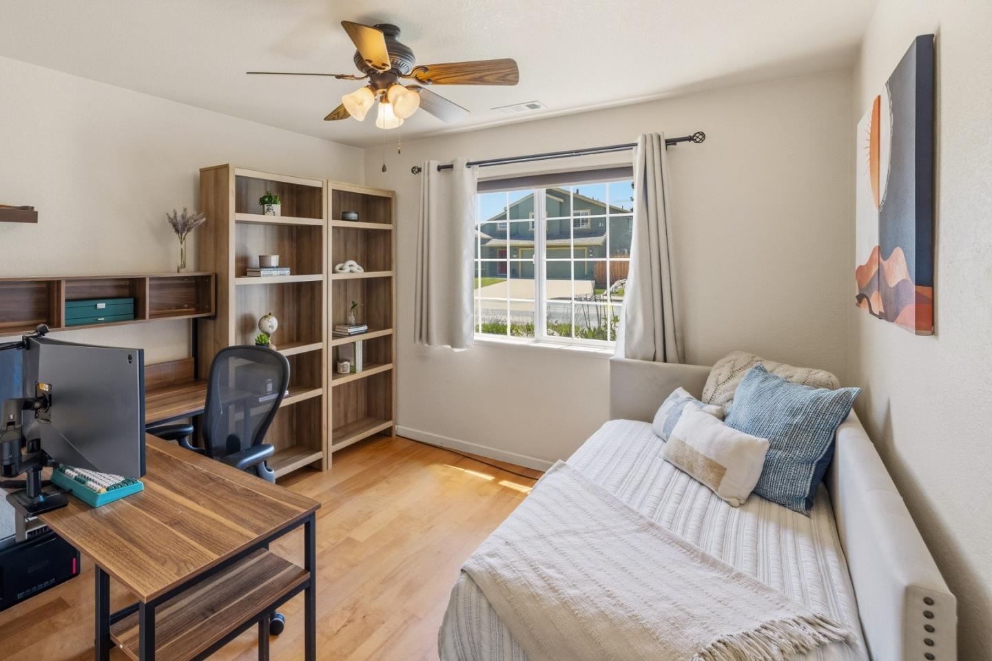 750 Ruger Court Hollister, CA 95023 - Photo 13 of 15 a bedroom with a bed furniture and a window