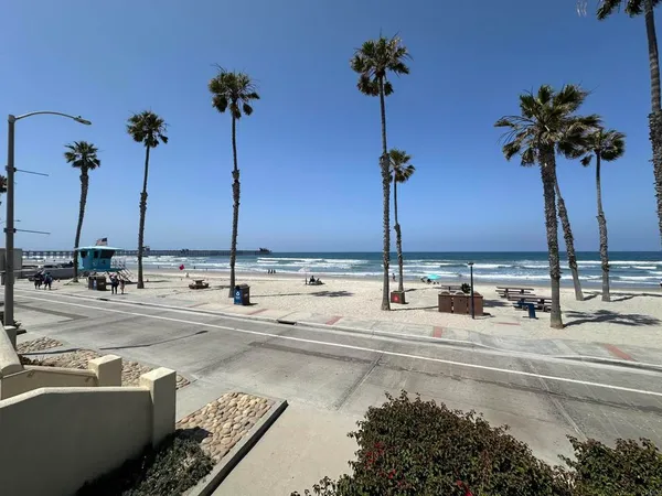 a view of a swimming pool with a table and chairs