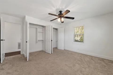 a view of empty room with windows