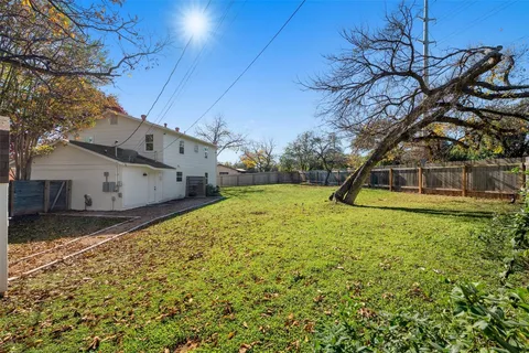 a house view with a backyard space