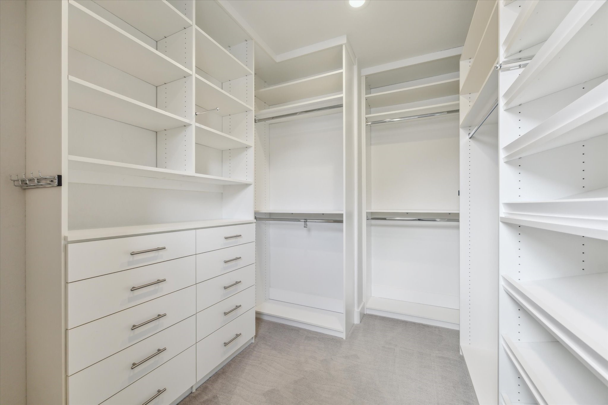 1122 Thompson Street Houston, TX 77007 - Photo 20 of 24 Primary closet with custom built-ins.