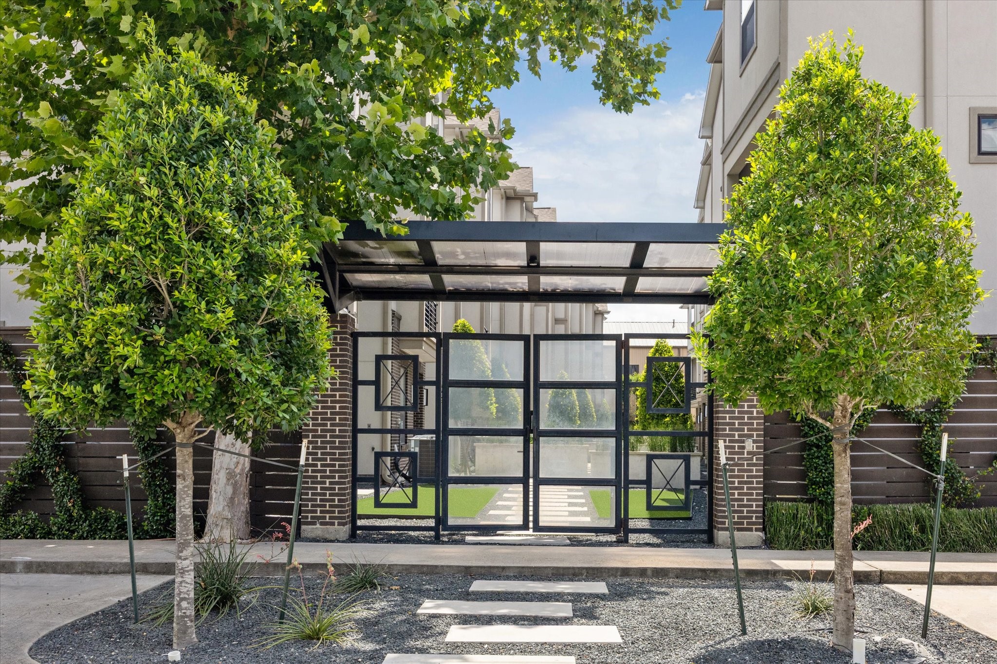 1122 Thompson Street Houston, TX 77007 - Photo 2 of 24 Secure gated entrance to the complex.