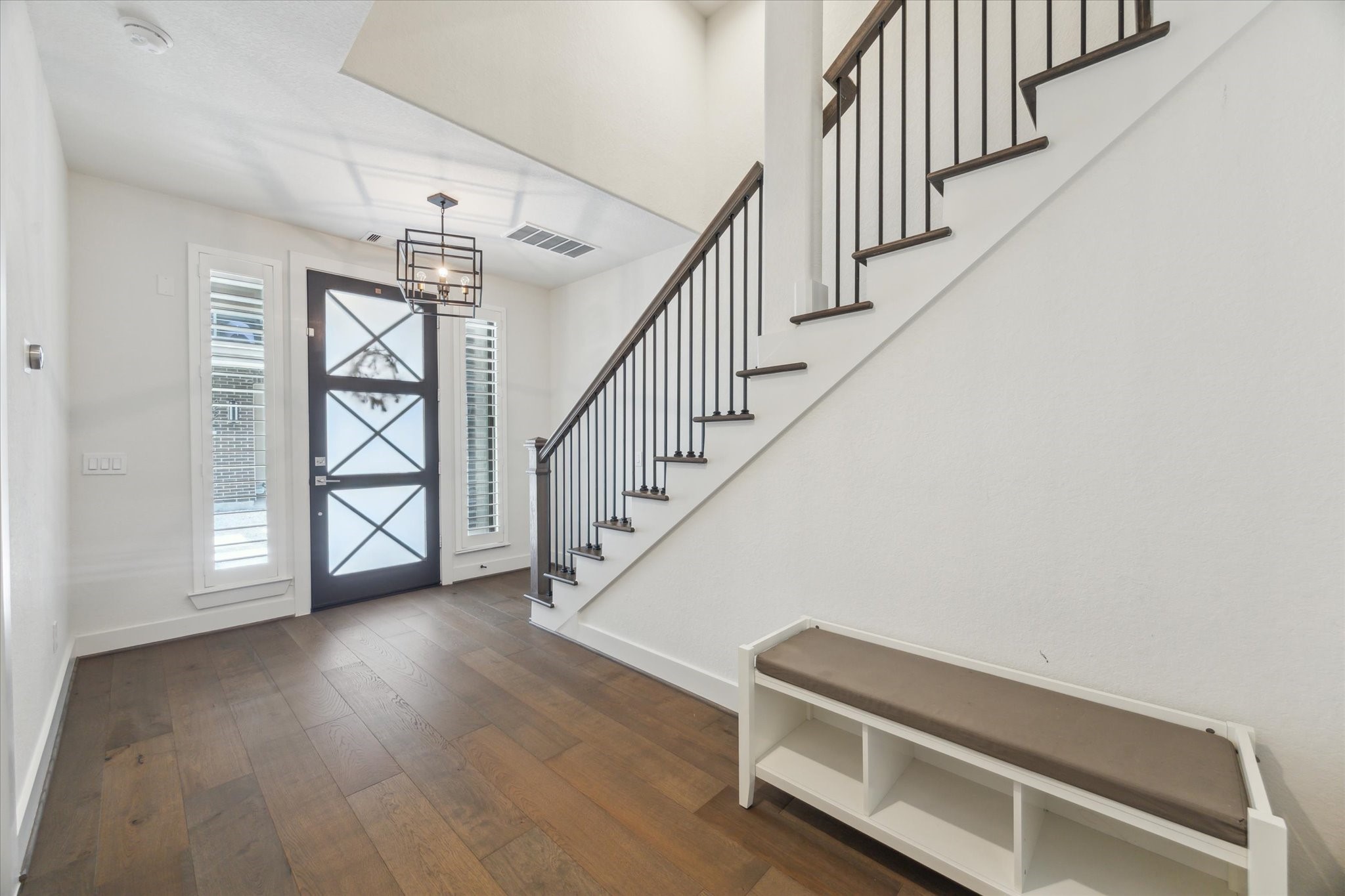 1122 Thompson Street Houston, TX 77007 - Photo 4 of 24 Entry to the first floor. On this floor, you'll find a bedroom with ensuite bath and access to the garage.