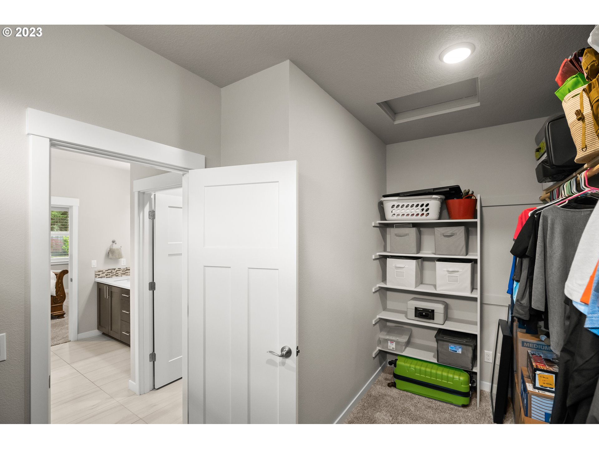 16316 Kitty Hawk Avenue Oregon City, OR 97045 - Photo 18 of 29 a view of walk in closet with clothes and shoes