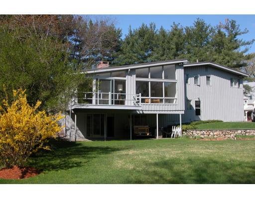 45 Harwich Road Newton, MA 02467 - Photo 5 of 5 a front view of a house with a yard
