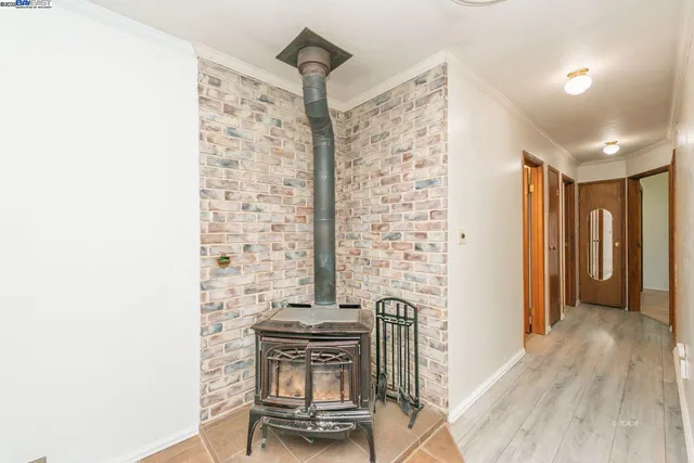 a bathroom with a shower sink and mirror
