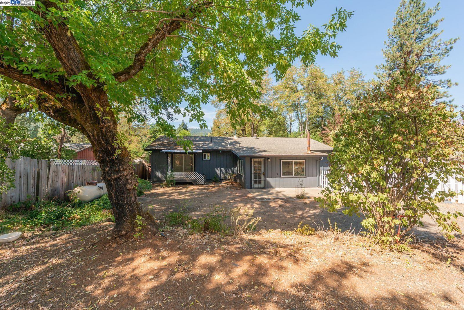 395 Masonic Lane Weaverville, CA 96093 - Photo 31 of 40 a view of a house with a tree in the yard
