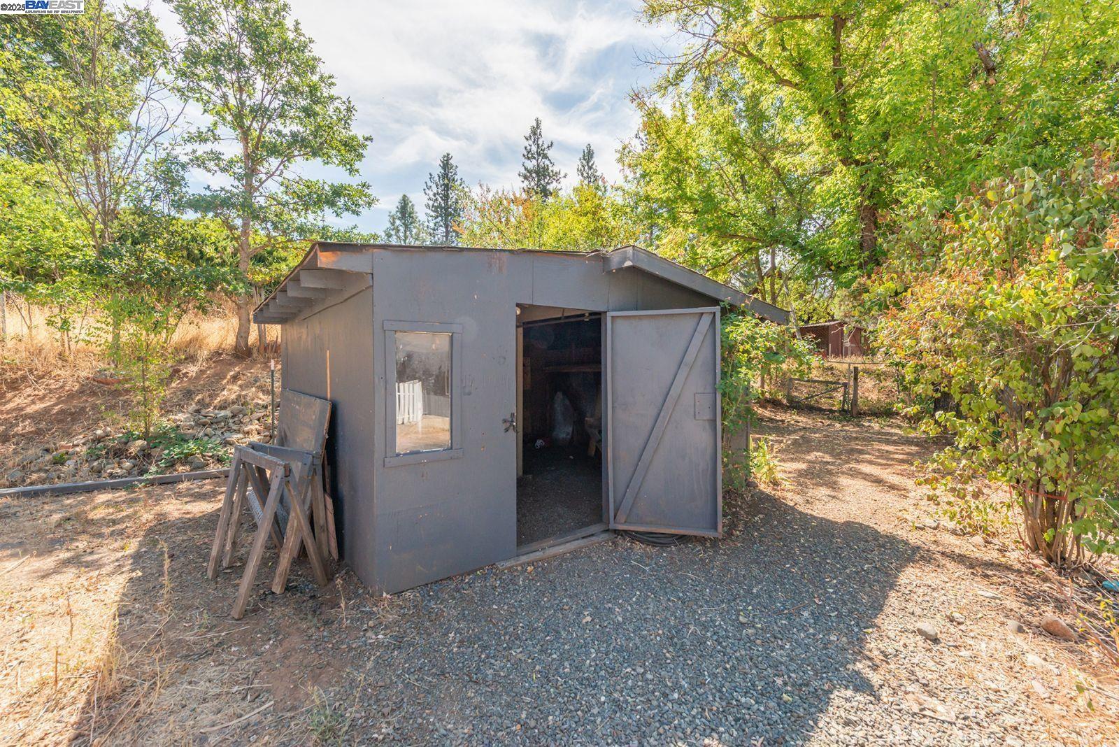 395 Masonic Lane Weaverville, CA 96093 - Photo 32 of 40 a view of a house with a yard and garage
