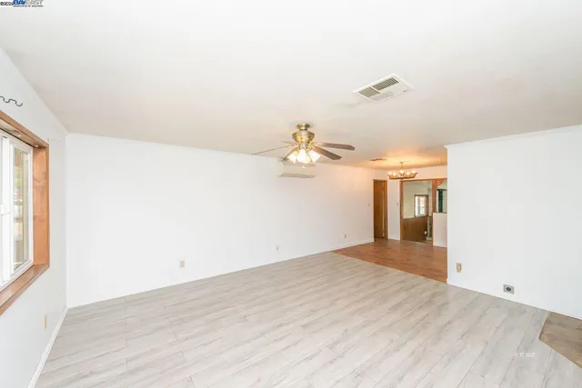 a view of a room that has a window