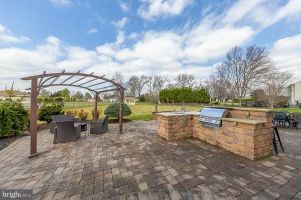 a view of a terrace with sitting area