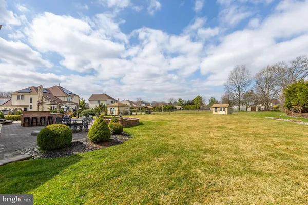 an aerial view of a house with a ocean view