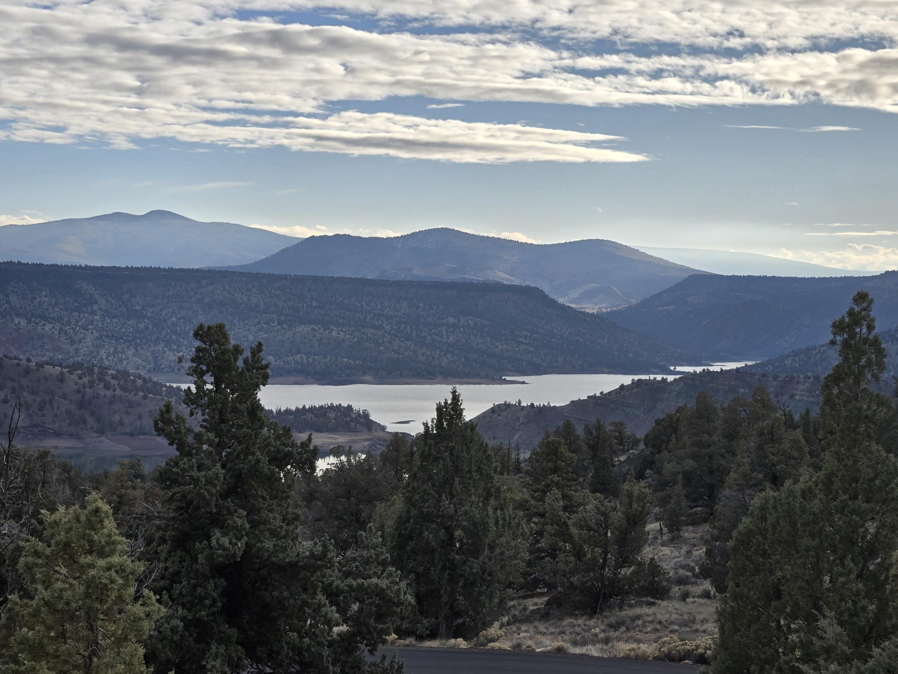 10033 Pavati Road, Unit LOT 34 Prineville, OR 97754 - Photo 1 of 10 a view of a house with a mountain