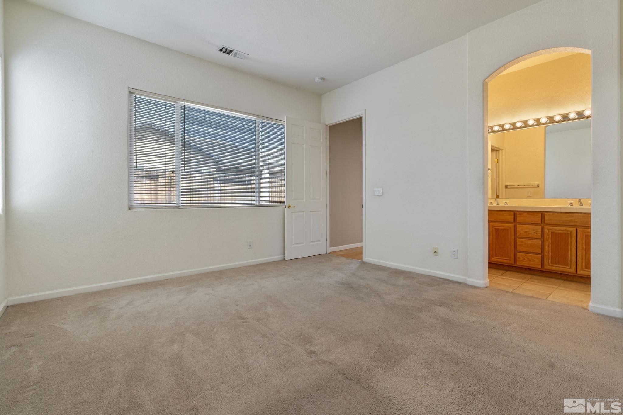 10503 Meeks Bay Court Reno, NV 89521 - Photo 16 of 28 an empty room with a window