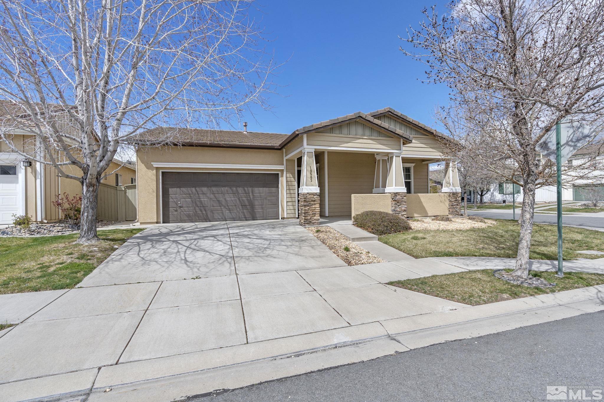 10503 Meeks Bay Court Reno, NV 89521 - Photo 2 of 28 a front view of a house with garden