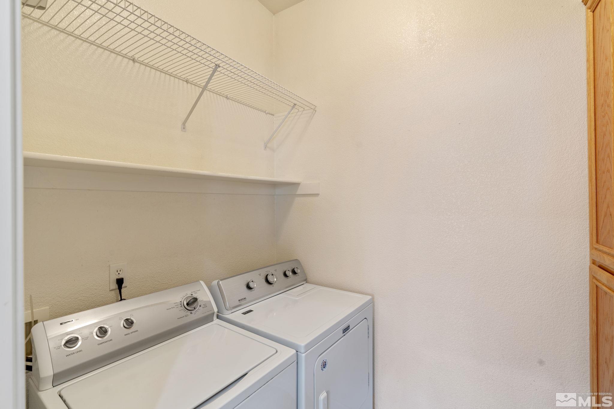10503 Meeks Bay Court Reno, NV 89521 - Photo 24 of 28 a utility room with dryer and washer
