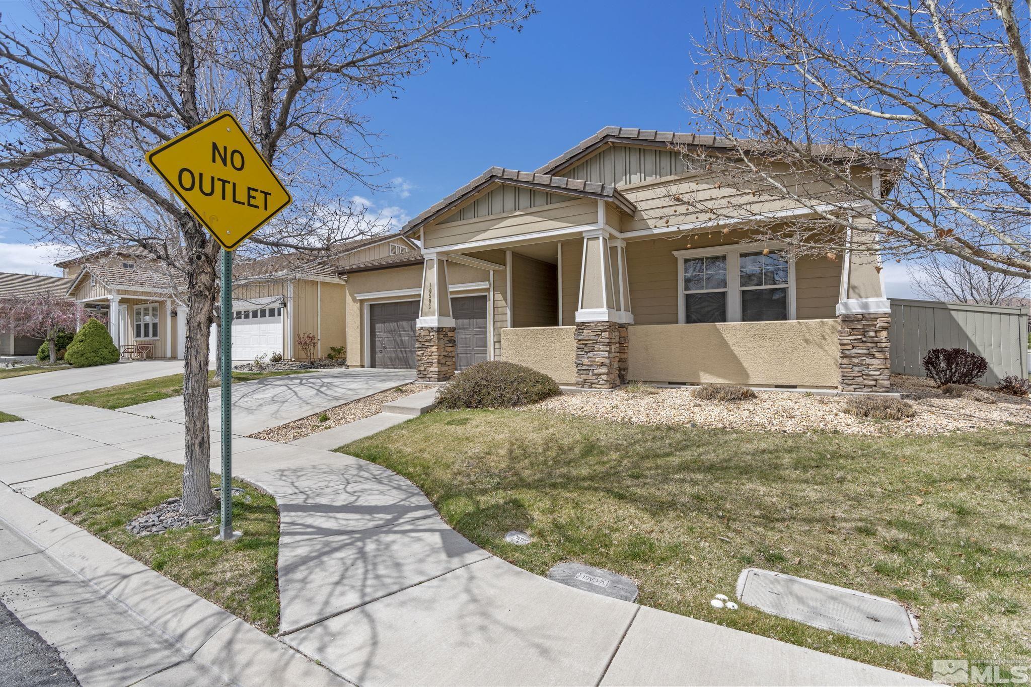 10503 Meeks Bay Court Reno, NV 89521 - Photo 3 of 28 a front view of a house with garden