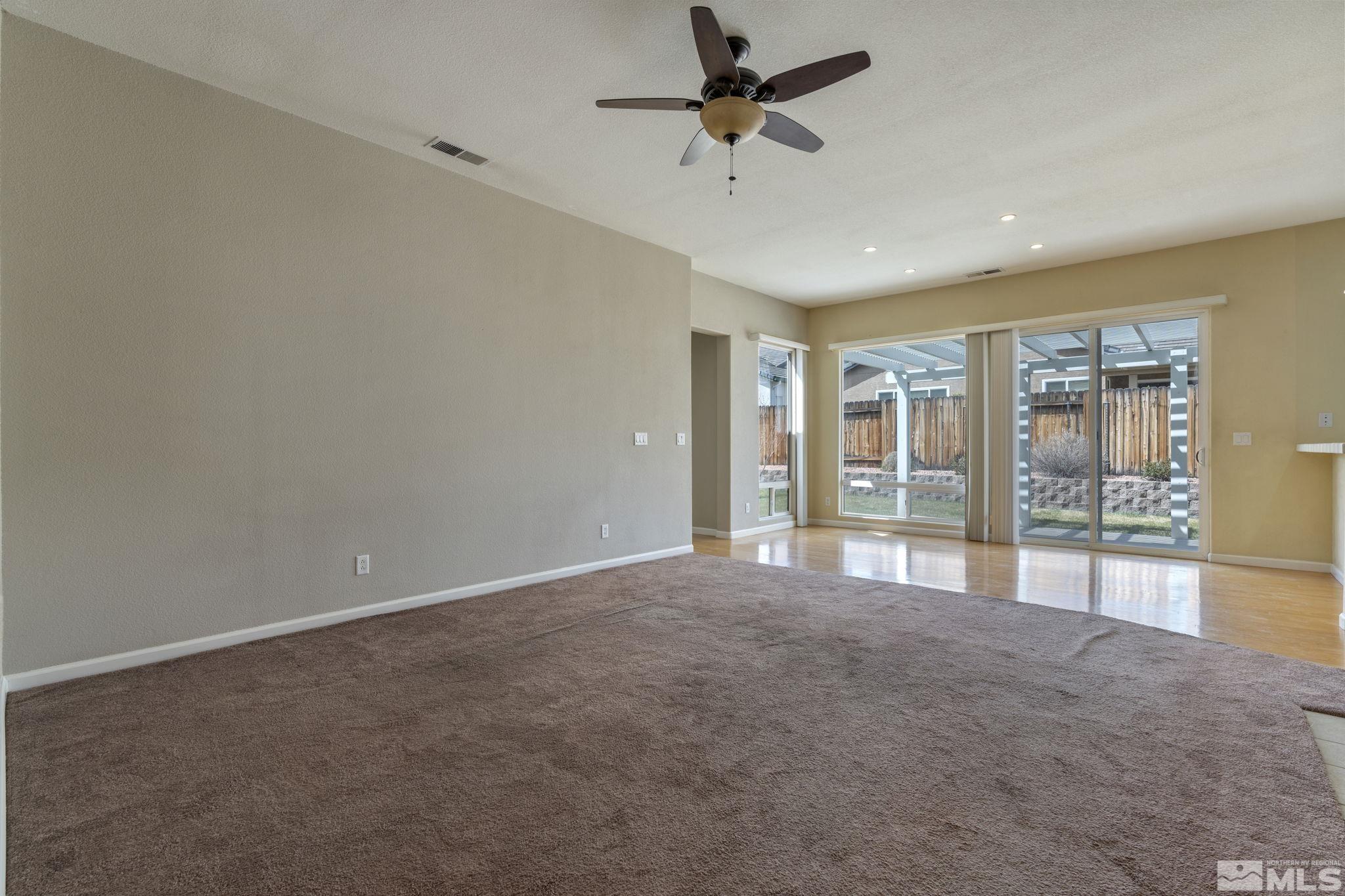 10503 Meeks Bay Court Reno, NV 89521 - Photo 7 of 28 a view of an empty room with a window