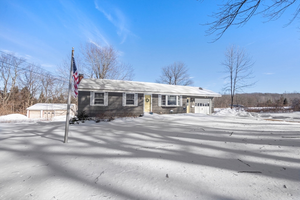 82 Glenwood Road Rutland, MA 01543 - Photo 1 of 30 a front view of a house with a yard