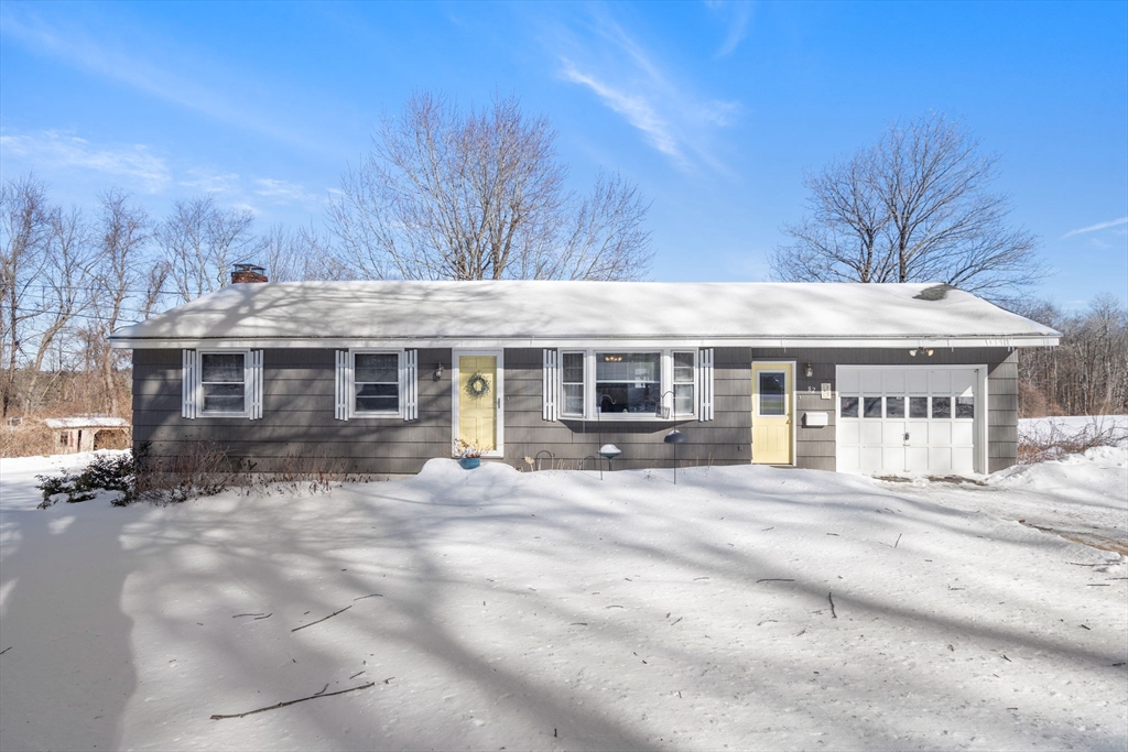 82 Glenwood Road Rutland, MA 01543 - Photo 2 of 30 a front view of a house with a yard