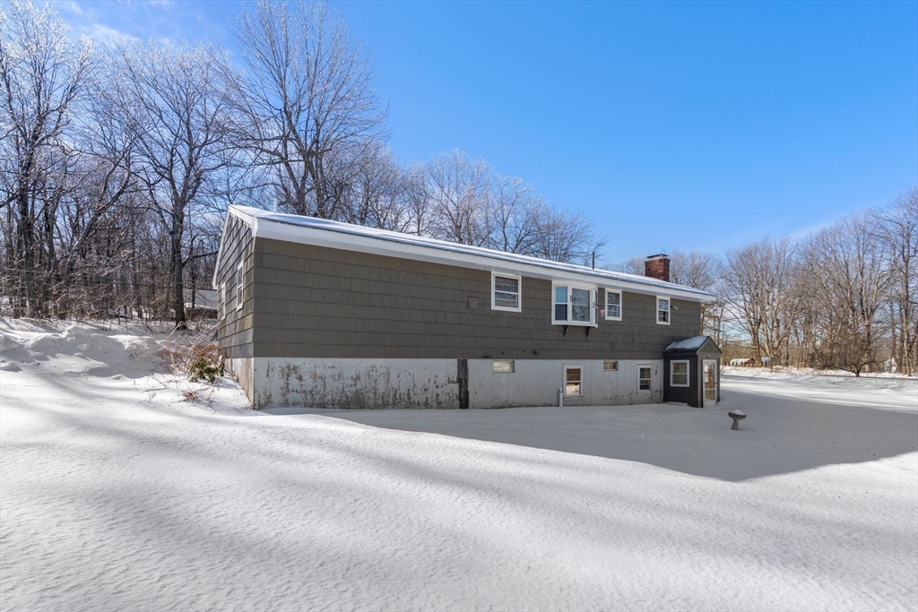 82 Glenwood Road Rutland, MA 01543 - Photo 28 of 30 a front view of a house with a yard