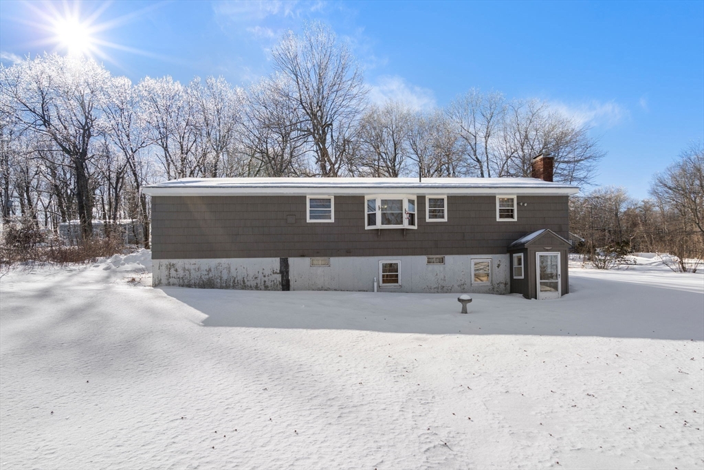 82 Glenwood Road Rutland, MA 01543 - Photo 29 of 30 a view of a house with a yard