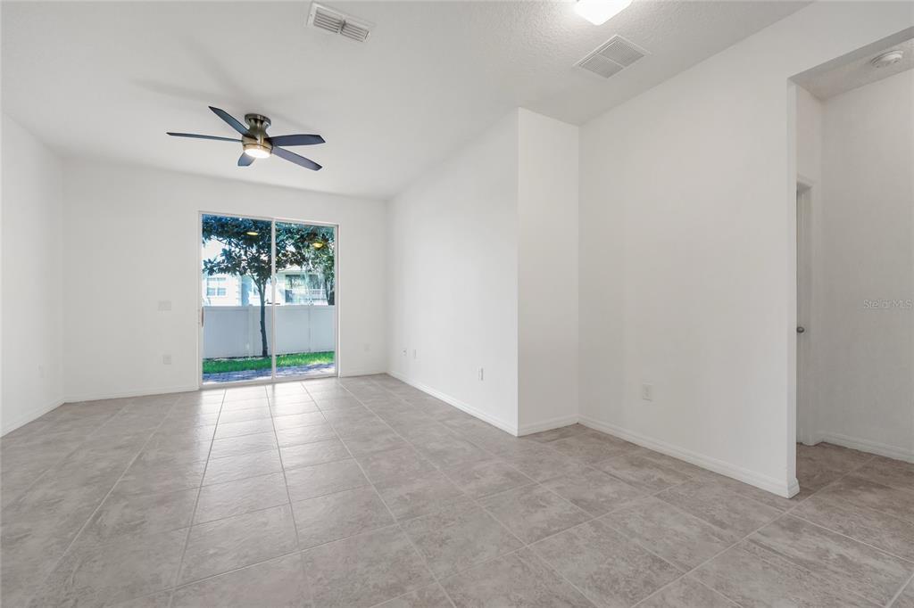 4824 Poolside Drive St. Cloud, FL 34769 - Photo 8 of 29 an empty room with windows and closet